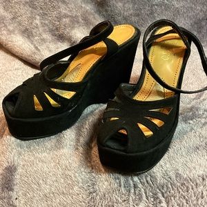 Used ankle strap open toe wedge in Black suede Size 7.